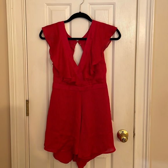 Red romper with open back. Bought from Lulu’s but never worn. Size Small - Picture 1 of 4